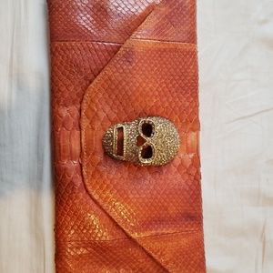 Leather clutch with ornante 3d skull